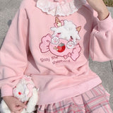 pull chat kawaii rose pastel avec bonbon